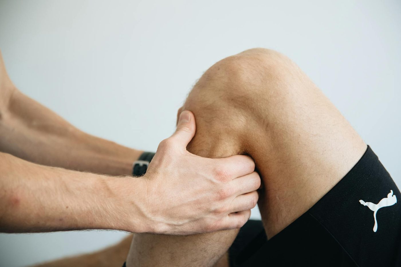 Physiotherapy session focused on knee support and recovery